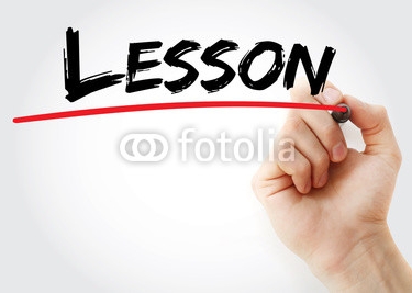 Hand_writing_Lesson_with_marker_business_concept.jpg